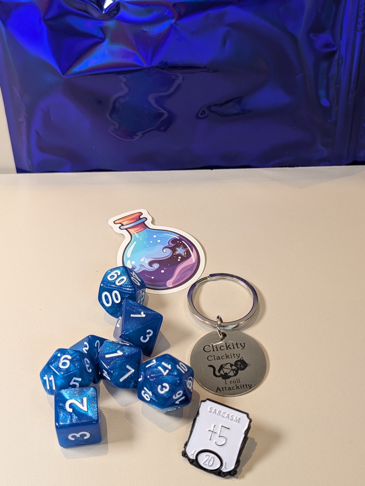 Blue Dice Pack – Polyhedral Dice Set with Sticker, Keyring, and Badge!