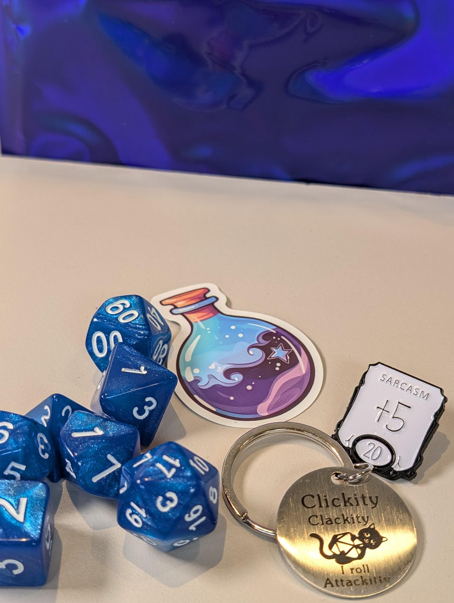 Blue Dice Pack – Polyhedral Dice Set with Sticker, Keyring, and Badge!