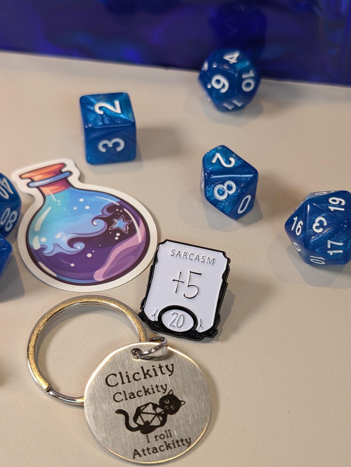 Blue Dice Pack – Polyhedral Dice Set with Sticker, Keyring, and Badge!