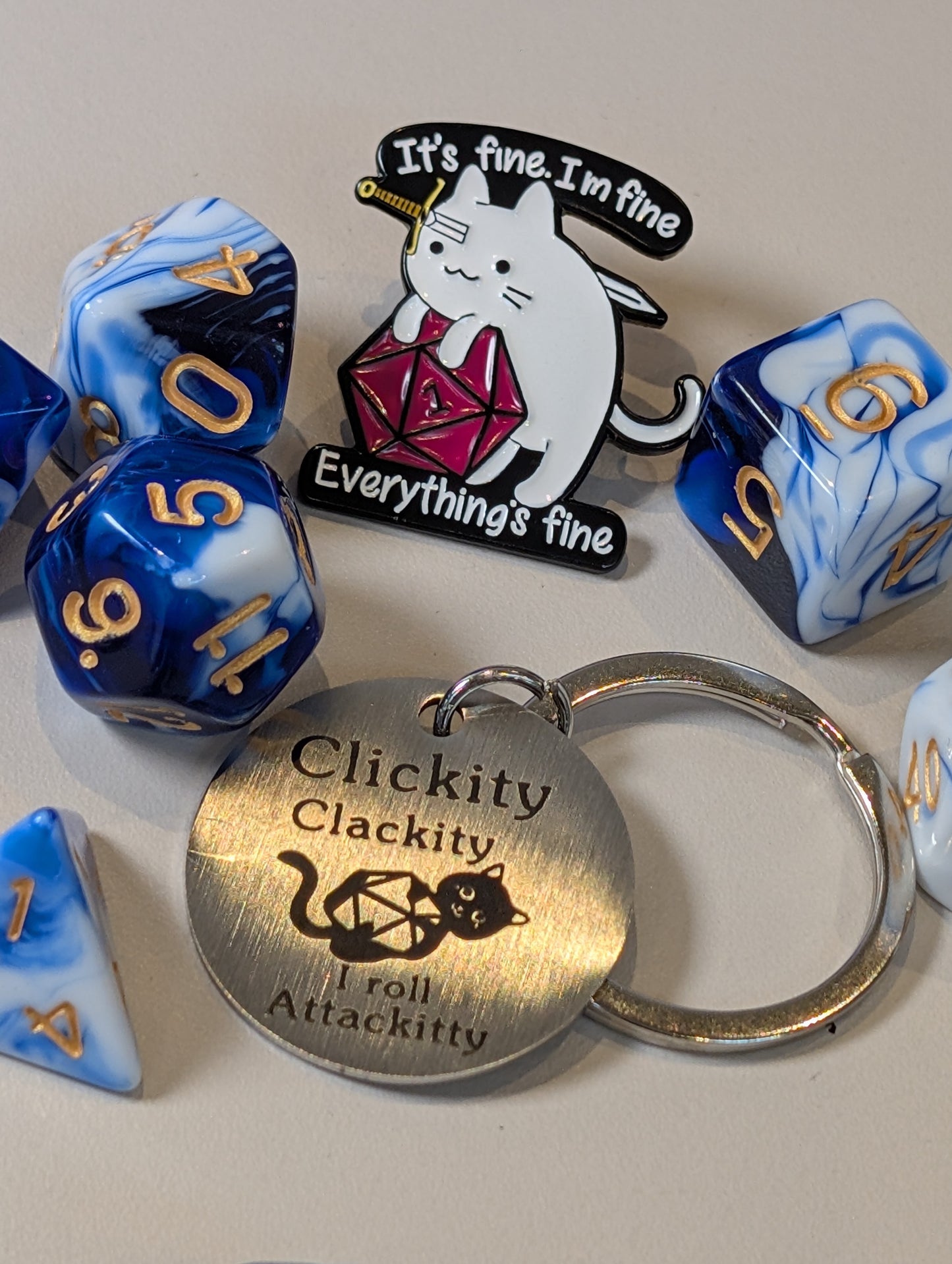 Blue & white Dice Pack – Polyhedral Dice Set with Sticker, Keyring, and Badge!