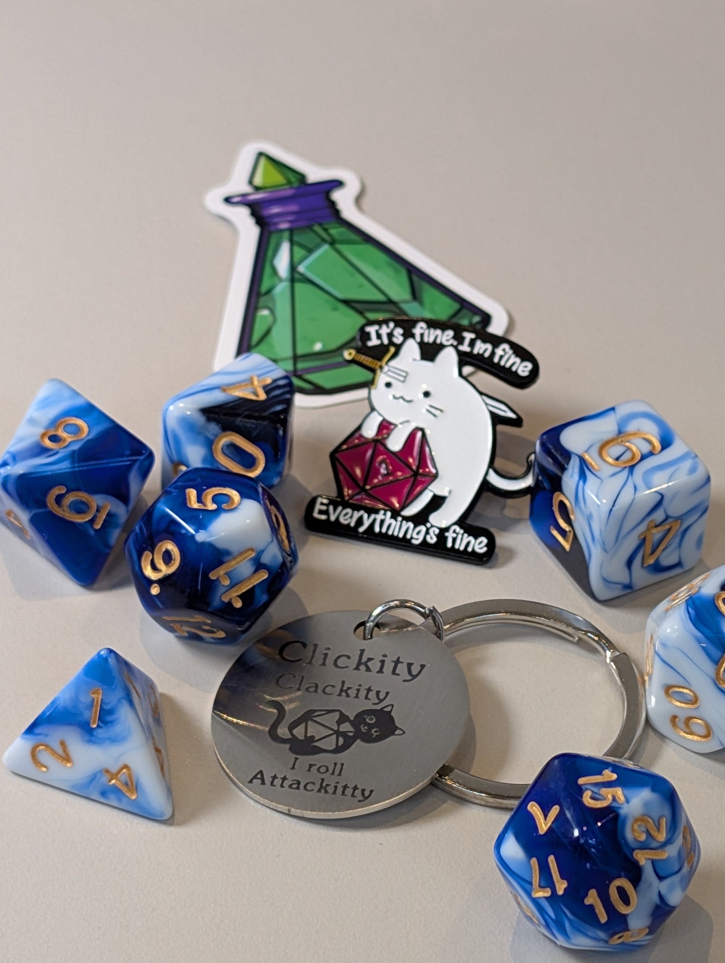 Blue & white Dice Pack – Polyhedral Dice Set with Sticker, Keyring, and Badge!