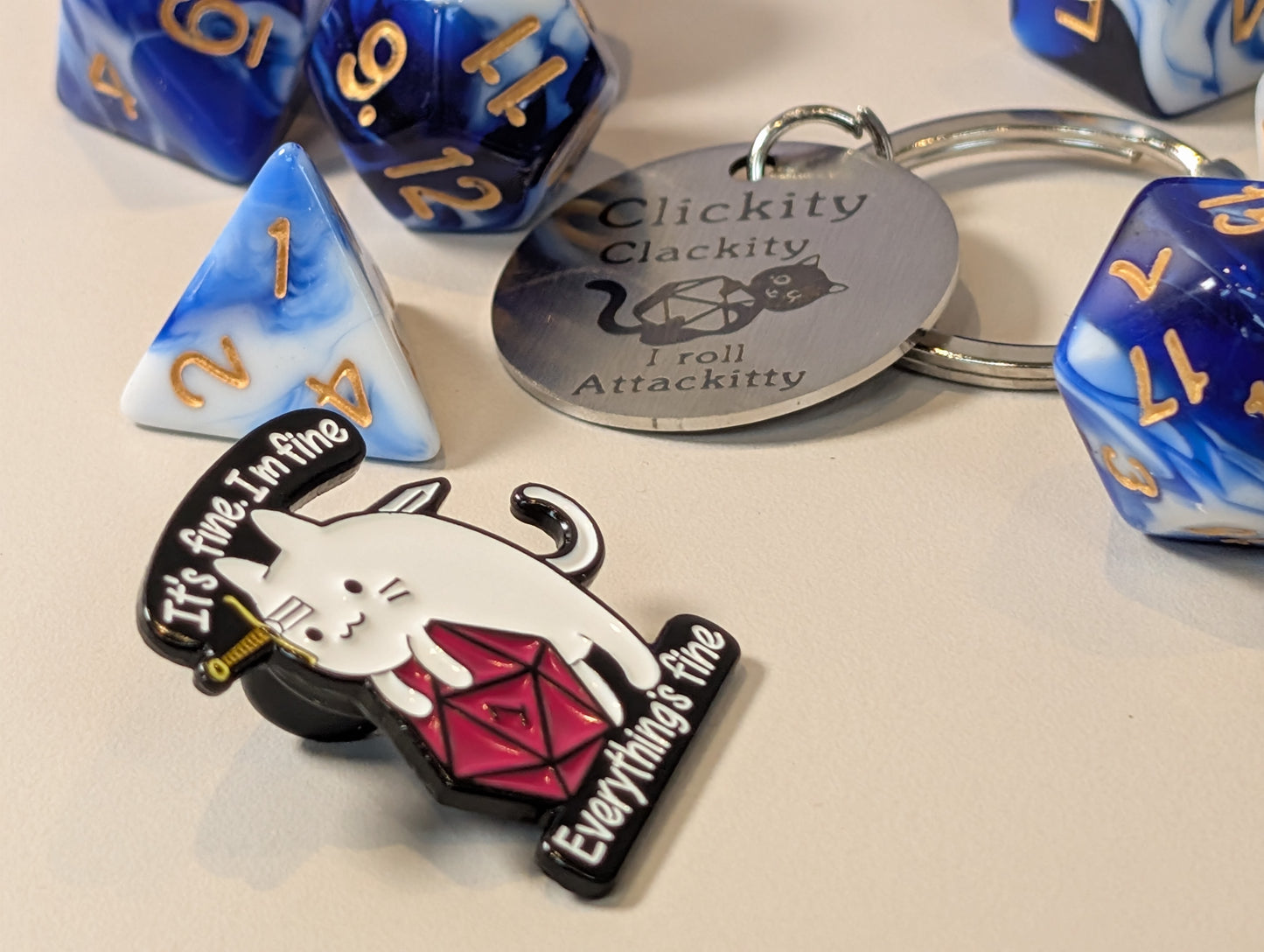 Blue & white Dice Pack – Polyhedral Dice Set with Sticker, Keyring, and Badge!