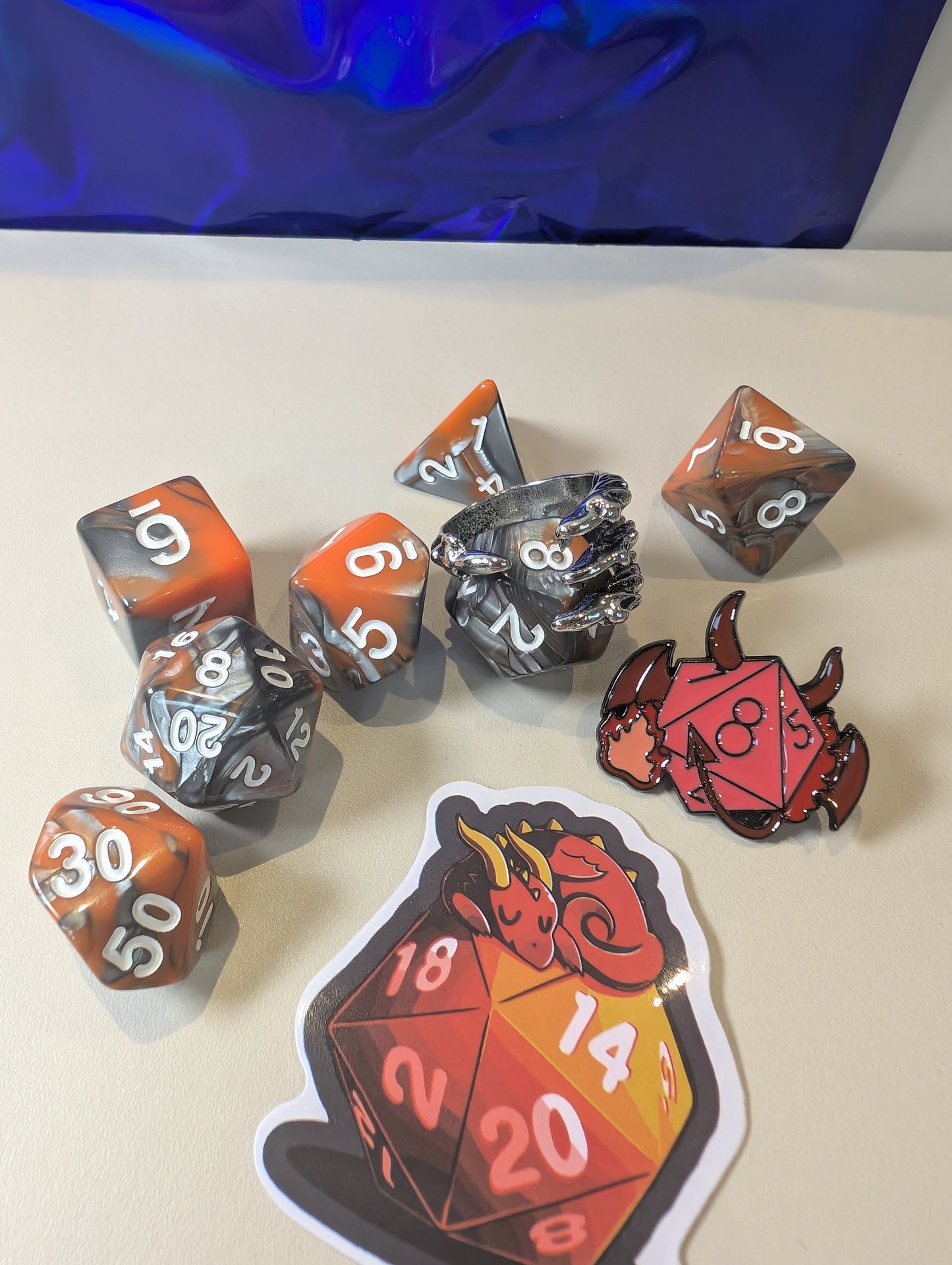 volcanic dragon Dice Pack – Polyhedral Dice Set with Sticker, ring, and Badge!