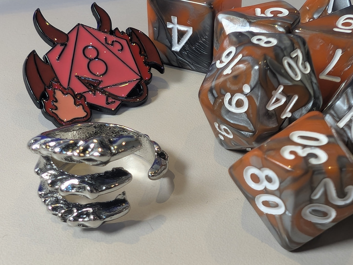 volcanic dragon Dice Pack – Polyhedral Dice Set with Sticker, ring, and Badge!