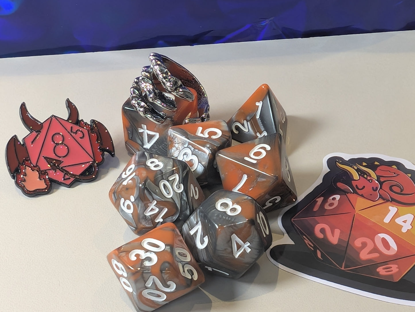 volcanic dragon Dice Pack – Polyhedral Dice Set with Sticker, ring, and Badge!