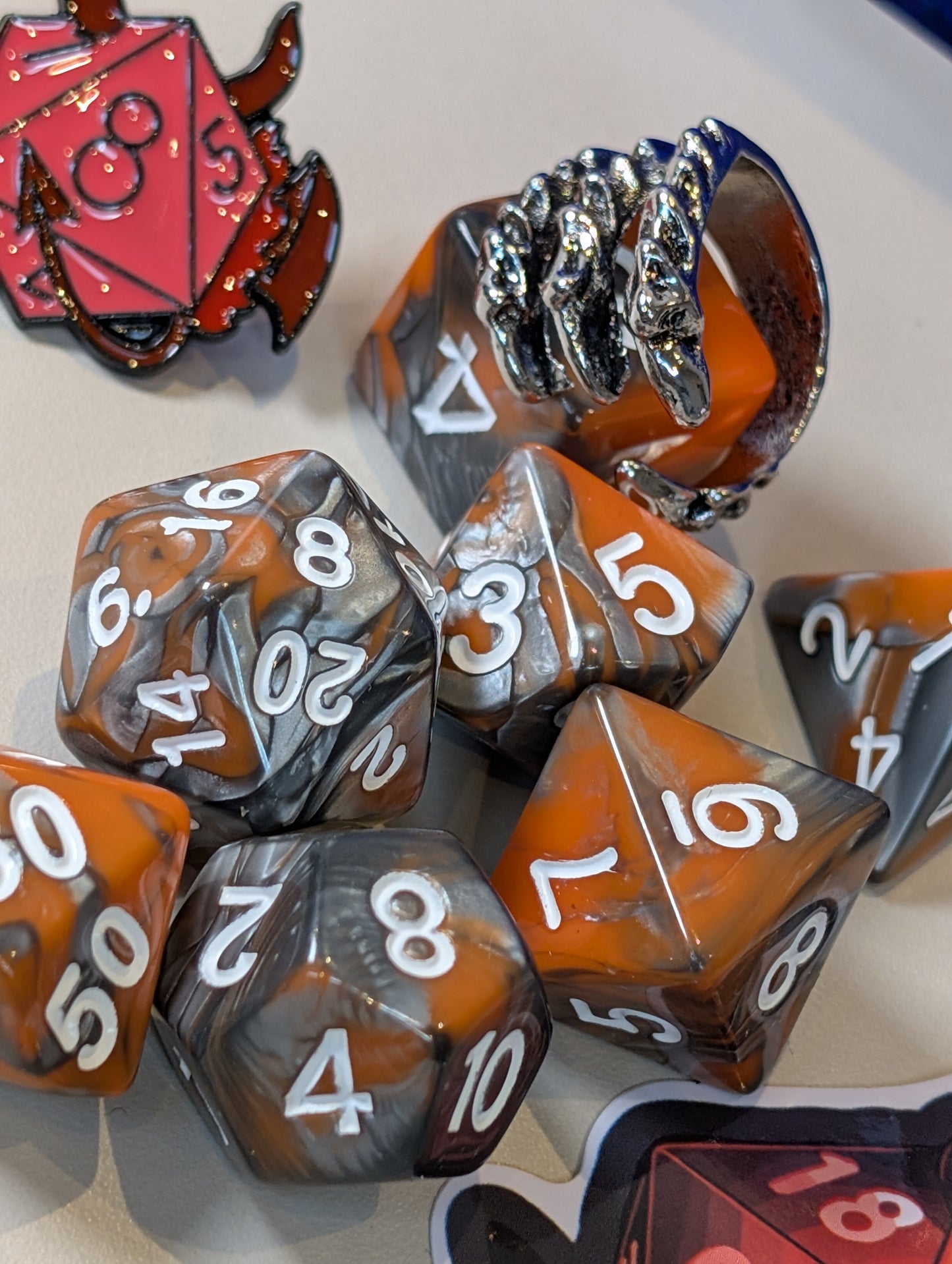volcanic dragon Dice Pack – Polyhedral Dice Set with Sticker, ring, and Badge!