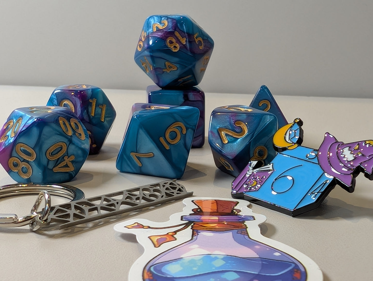 Wizard Dice Pack – Polyhedral Dice Set with Sticker, keyring, and Badge!