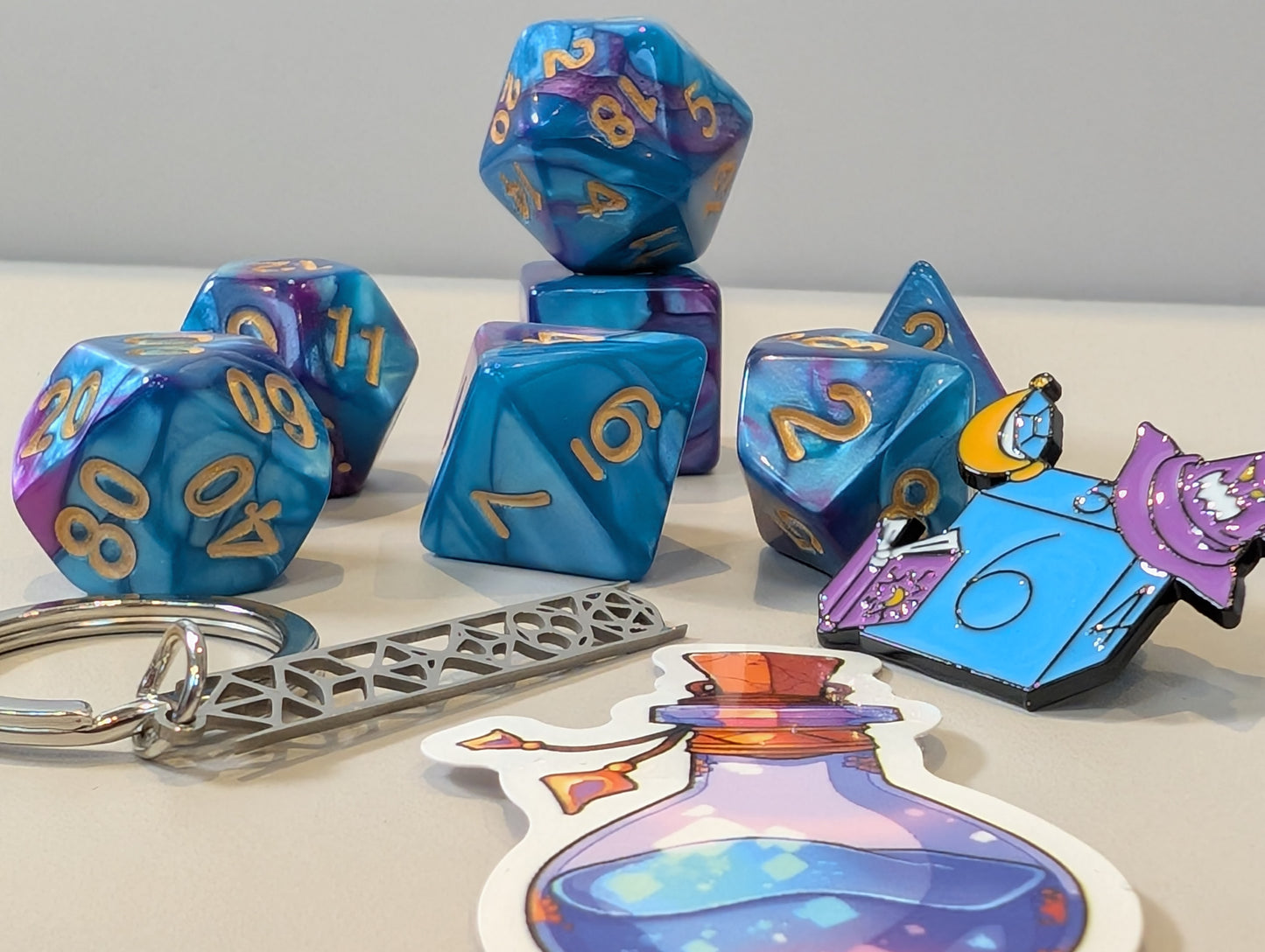 Wizard Dice Pack – Polyhedral Dice Set with Sticker, keyring, and Badge!