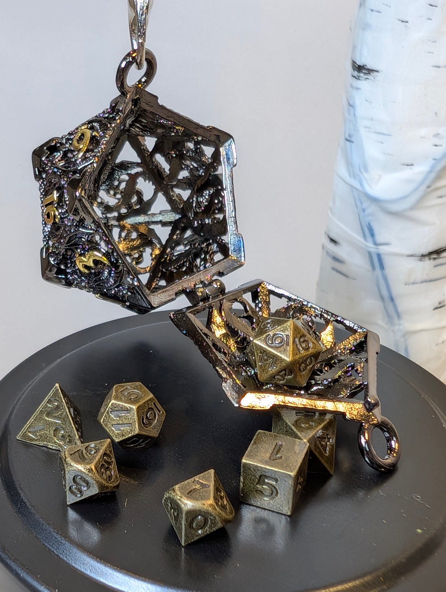 Gilded Void Hollow Metal Dice Set & D20 Keychain – black and gold metal mini RPG Dice
