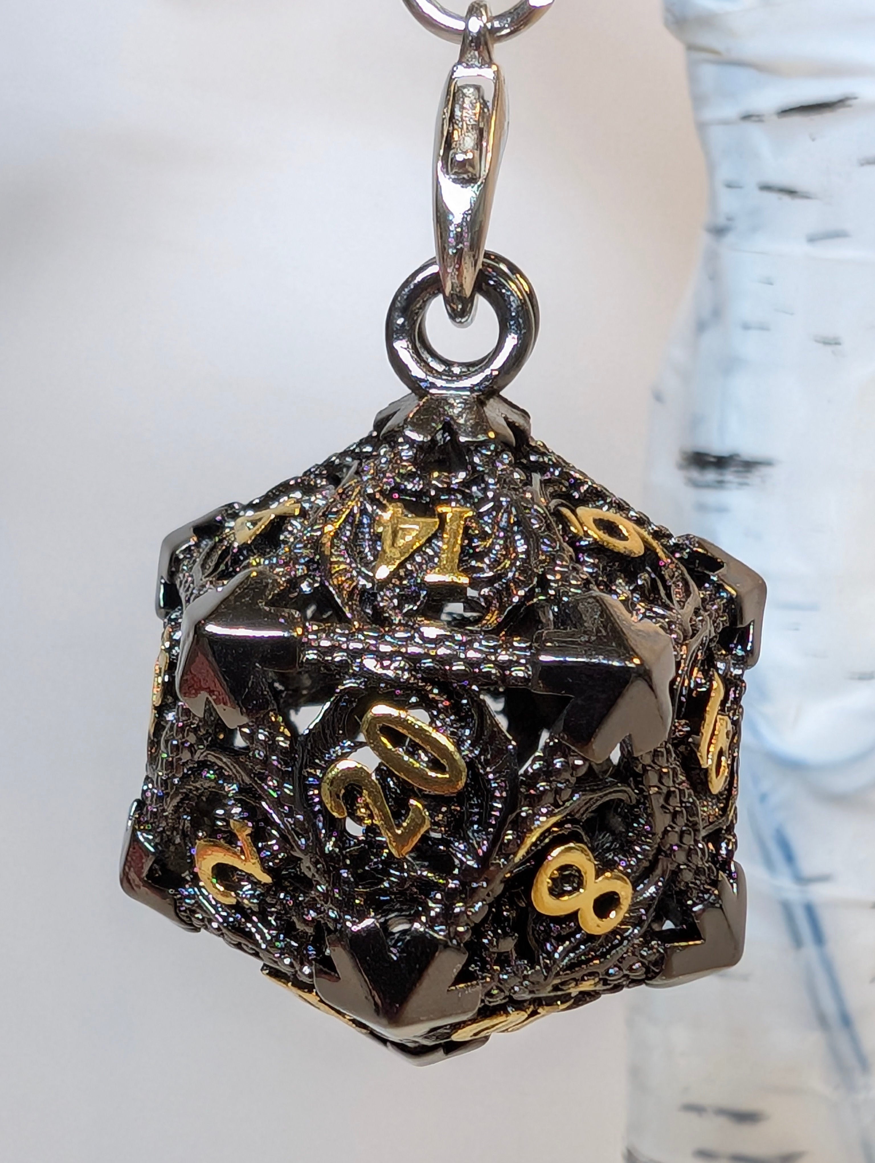 Gilded Void Hollow Metal Dice Set & D20 Keychain – black and gold