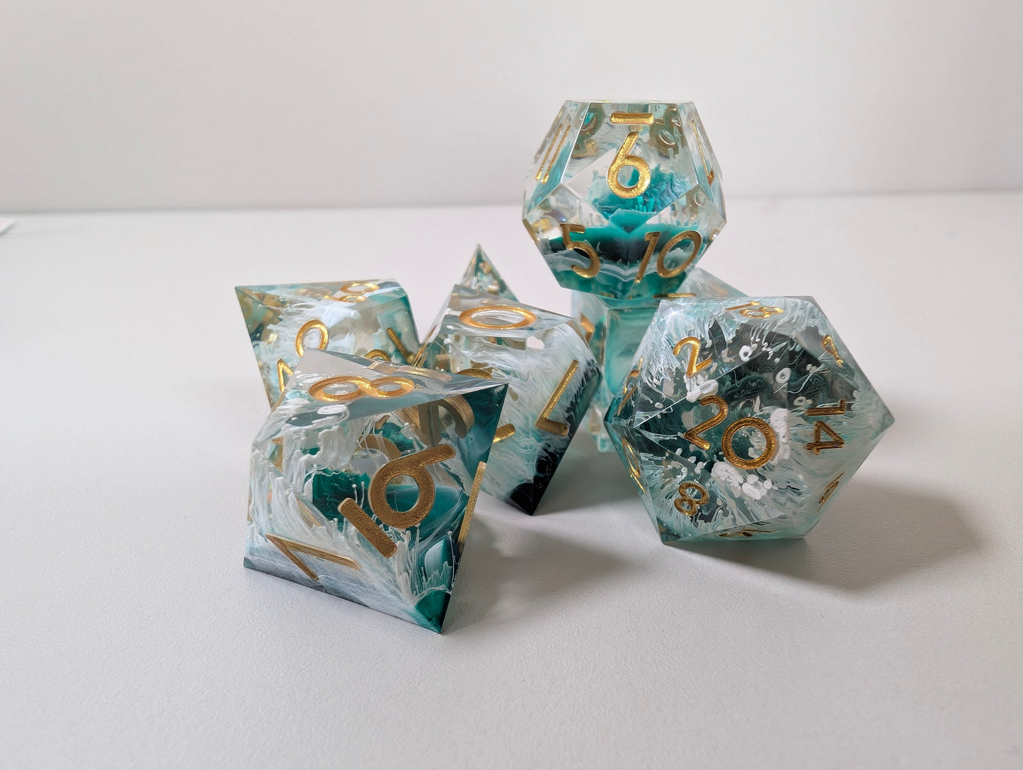 Mermaid wishes ttrpg polyhedral dice gift set, sea waves design in clam shell case