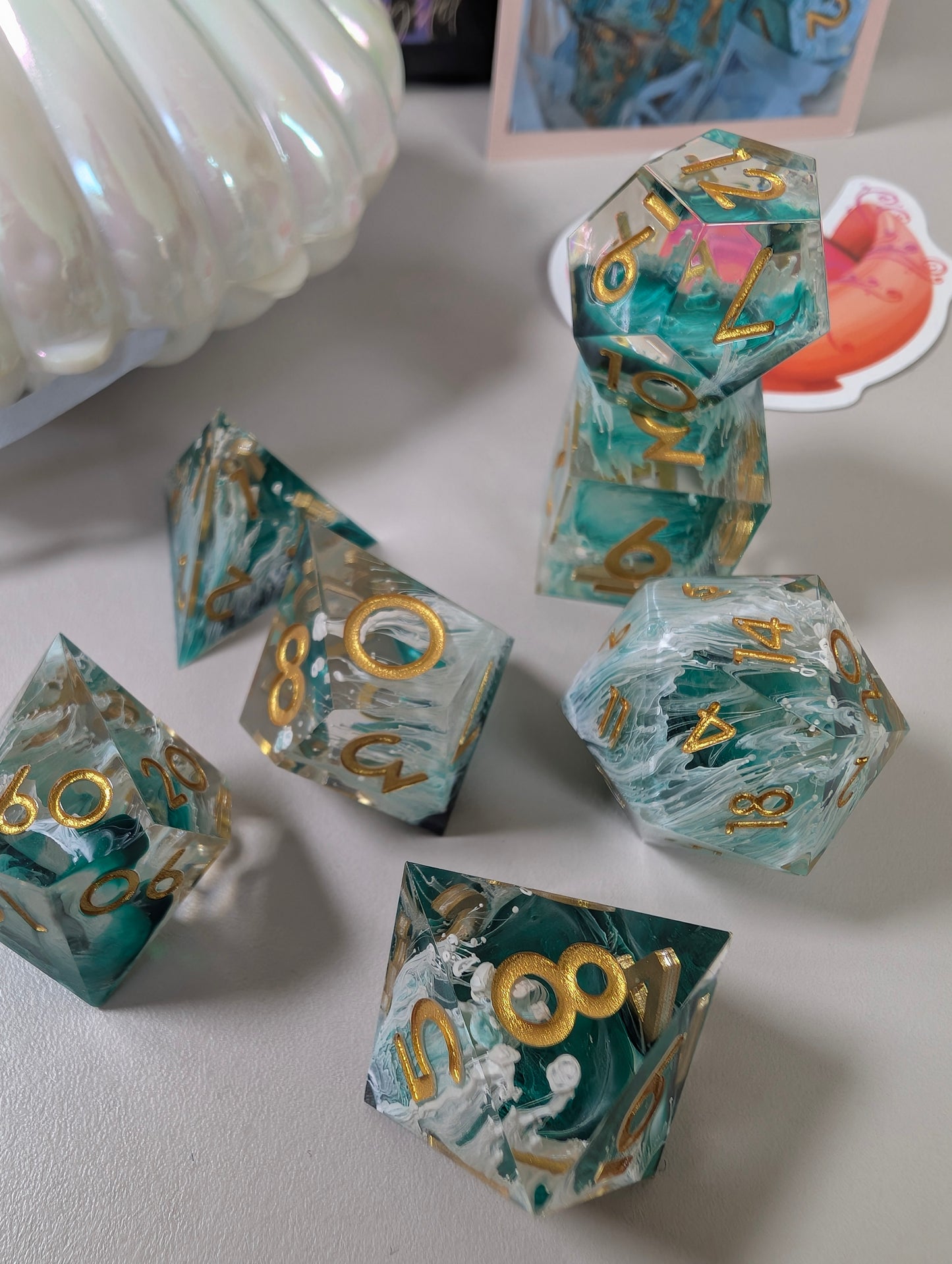 Mermaid wishes ttrpg polyhedral dice gift set, sea waves design in clam shell case