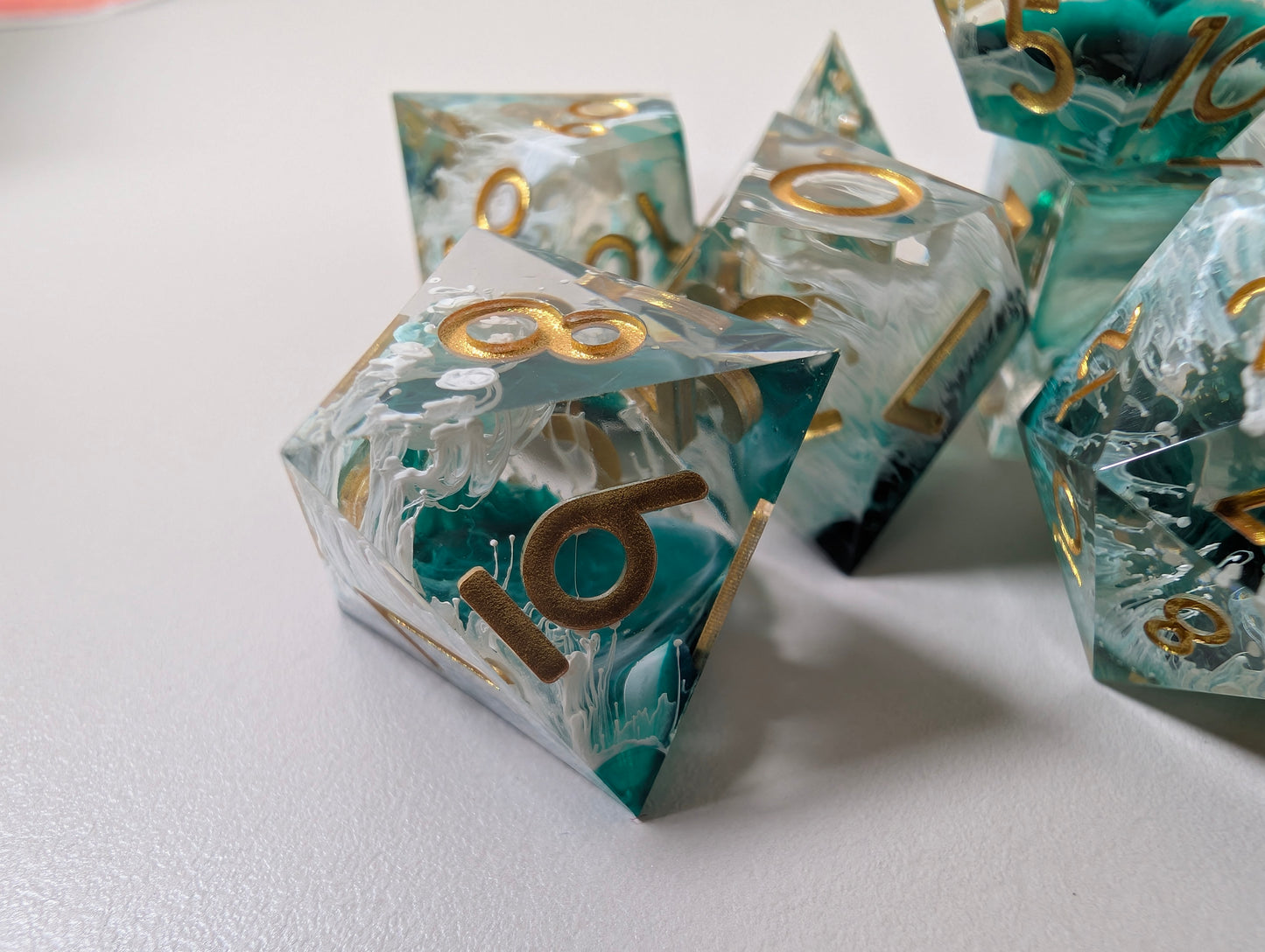 Mermaid wishes ttrpg polyhedral dice gift set, sea waves design in clam shell case