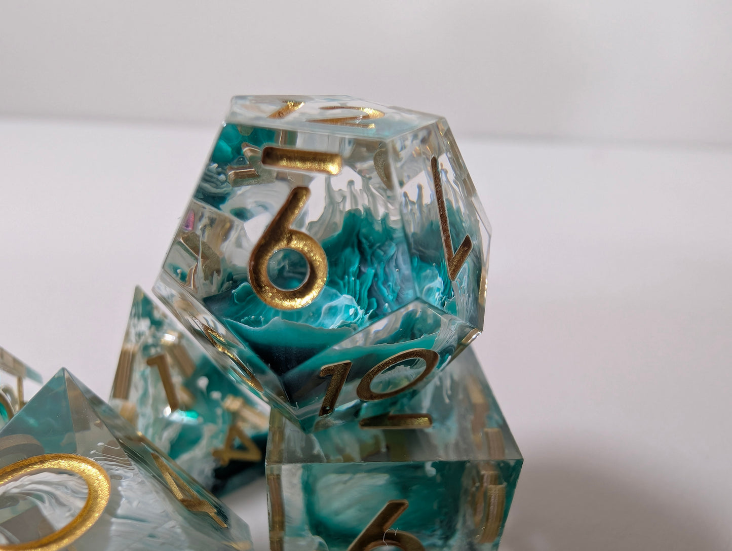 Mermaid wishes ttrpg polyhedral dice gift set, sea waves design in clam shell case